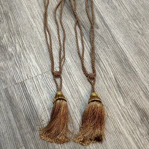 Metallic bronze coloured tassel curtain tie back holders. New.